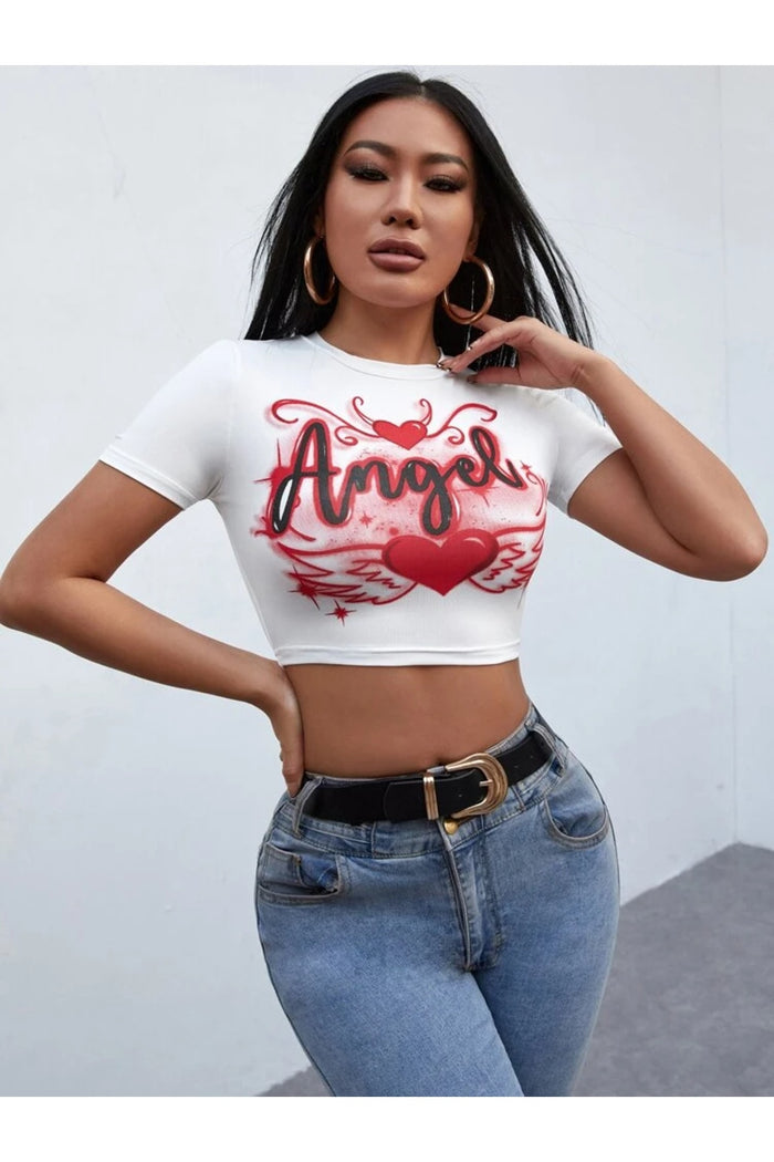 Kadın Beyaz Baskılı Kısa Kollu Vücuda Oturan Crop Top Bluz