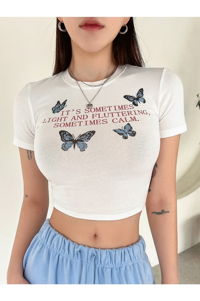Kadın Beyaz Baskılı Kısa Kollu Vücuda Oturan Crop Bluz